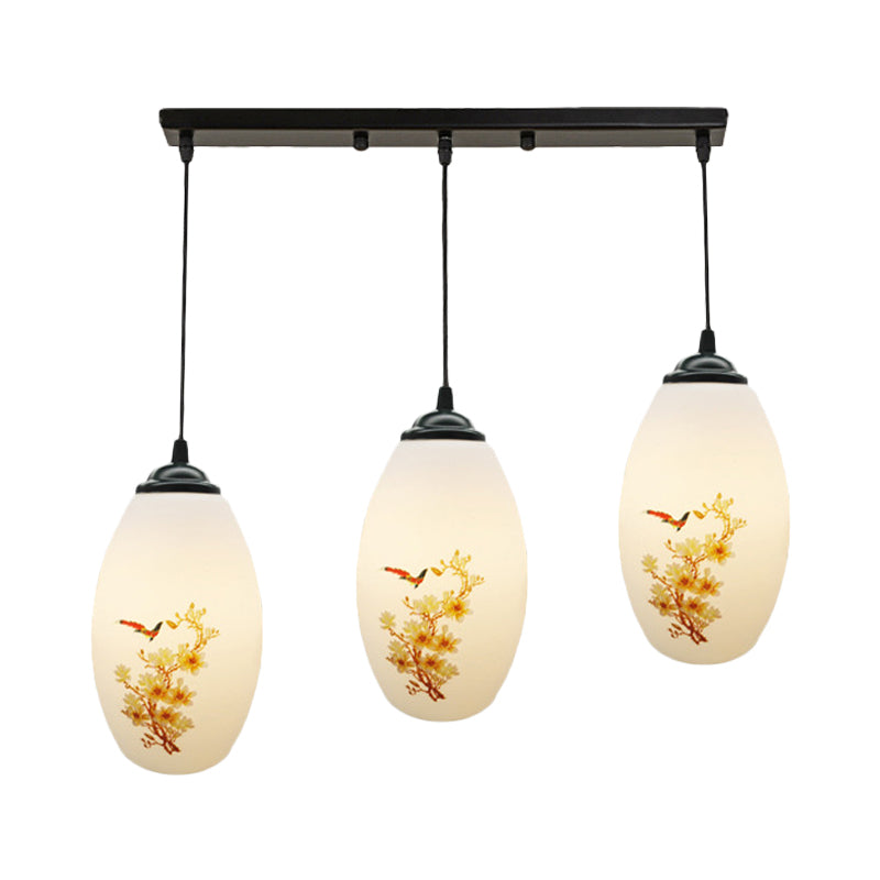3 Bulbs Multiple Hanging Light Modern Oblong Frosted White Glass Linear/Round Canopy Pendulum Lamp with Flower Pattern Clearhalo 'Ceiling Lights' 'Glass shade' 'Glass' 'Pendant Lights' 'Pendants' Lighting' 802083
