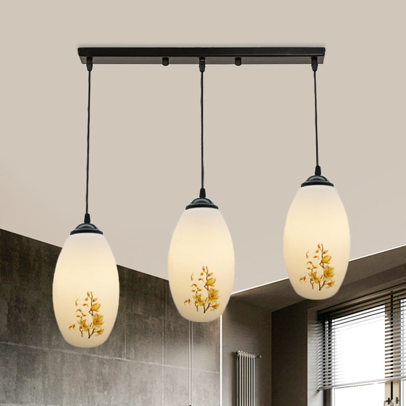 3 Bulbs Multiple Hanging Light Modern Oblong Frosted White Glass Linear/Round Canopy Pendulum Lamp with Flower Pattern White A Linear Clearhalo 'Ceiling Lights' 'Glass shade' 'Glass' 'Pendant Lights' 'Pendants' Lighting' 802084