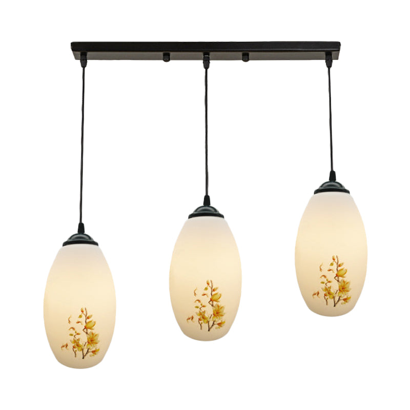 3 Bulbs Multiple Hanging Light Modern Oblong Frosted White Glass Linear/Round Canopy Pendulum Lamp with Flower Pattern Clearhalo 'Ceiling Lights' 'Glass shade' 'Glass' 'Pendant Lights' 'Pendants' Lighting' 802087