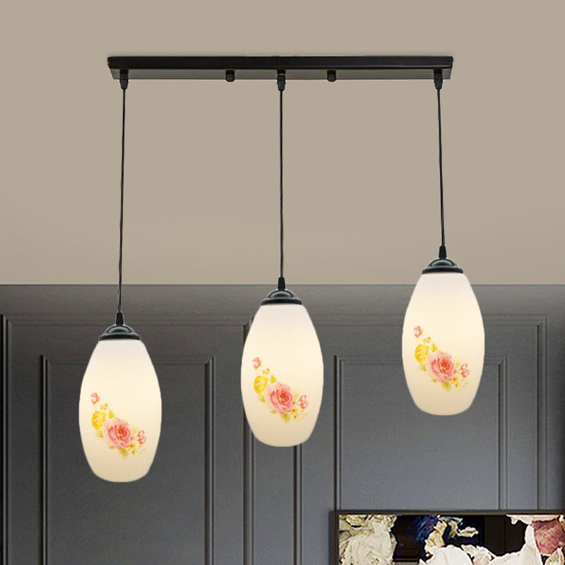 3 Bulbs Multiple Hanging Light Modern Oblong Frosted White Glass Linear/Round Canopy Pendulum Lamp with Flower Pattern White D Linear Clearhalo 'Ceiling Lights' 'Glass shade' 'Glass' 'Pendant Lights' 'Pendants' Lighting' 802088