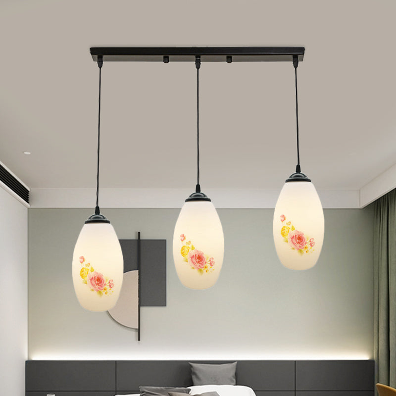 3 Bulbs Multiple Hanging Light Modern Oblong Frosted White Glass Linear/Round Canopy Pendulum Lamp with Flower Pattern Clearhalo 'Ceiling Lights' 'Glass shade' 'Glass' 'Pendant Lights' 'Pendants' Lighting' 802089