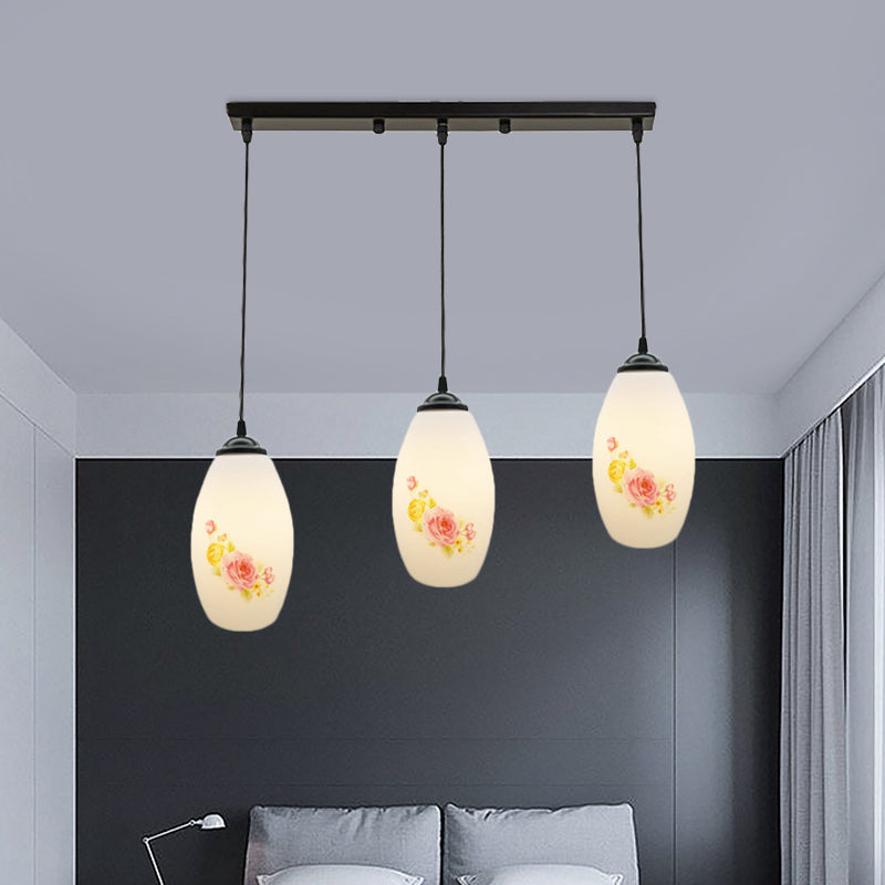 3 Bulbs Multiple Hanging Light Modern Oblong Frosted White Glass Linear/Round Canopy Pendulum Lamp with Flower Pattern Clearhalo 'Ceiling Lights' 'Glass shade' 'Glass' 'Pendant Lights' 'Pendants' Lighting' 802090