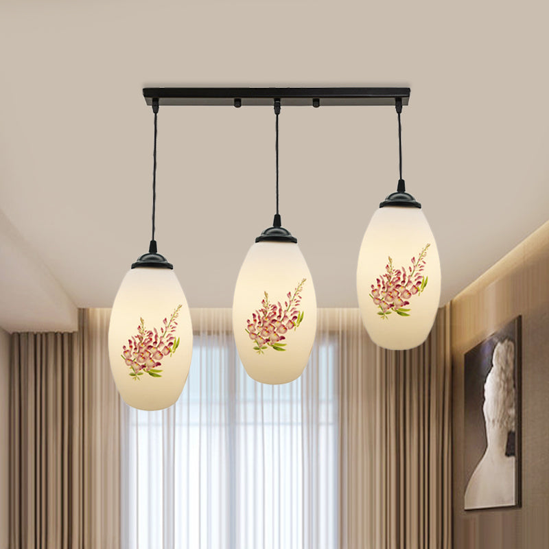 Minimalism Oval Multi Lamp Pendant 3 Heads White Frosted Glass Suspension Light in Black with Linear/Round Canopy Clearhalo 'Ceiling Lights' 'Glass shade' 'Glass' 'Pendant Lights' 'Pendants' Lighting' 802105