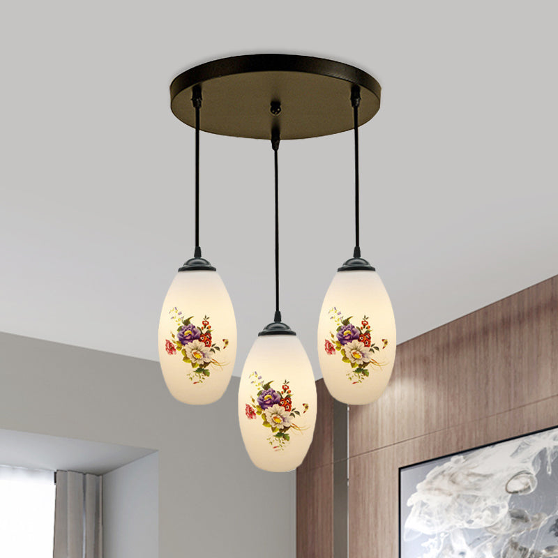 3 Lights Oval Multi-Pendant Modern Black Finish White Printed Glass Ceiling Hang Fixture with Round/Linear Canopy White D Round Clearhalo 'Ceiling Lights' 'Close To Ceiling Lights' 'Glass shade' 'Glass' 'Pendant Lights' 'Pendants' Lighting' 802129