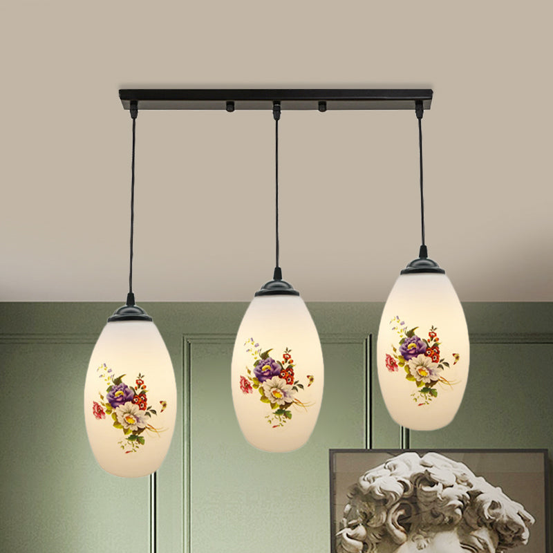 3 Lights Oval Multi-Pendant Modern Black Finish White Printed Glass Ceiling Hang Fixture with Round/Linear Canopy White D Linear Clearhalo 'Ceiling Lights' 'Close To Ceiling Lights' 'Glass shade' 'Glass' 'Pendant Lights' 'Pendants' Lighting' 802146