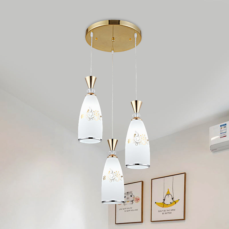 Gold/Black 3 Lights Multi Ceiling Light Modernist Opal Frosted Glass Dining Room Pendulum Lamp with Round Canopy Gold Clearhalo 'Ceiling Lights' 'Glass shade' 'Glass' 'Pendant Lights' 'Pendants' Lighting' 802233