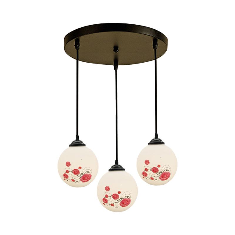 3 Heads Orb Multi-Pendant Modernism Black Finish White Frosted Glass Hanging Light Kit with Flower Pattern and Round/Linear Canopy Clearhalo 'Ceiling Lights' 'Glass shade' 'Glass' 'Pendant Lights' 'Pendants' Lighting' 802256
