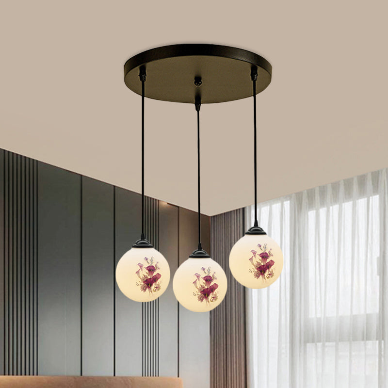 3 Heads Orb Multi-Pendant Modernism Black Finish White Frosted Glass Hanging Light Kit with Flower Pattern and Round/Linear Canopy Clearhalo 'Ceiling Lights' 'Glass shade' 'Glass' 'Pendant Lights' 'Pendants' Lighting' 802259