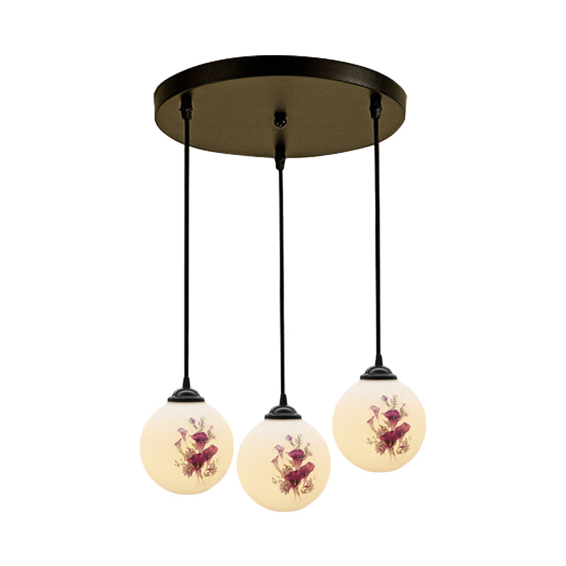 3 Heads Orb Multi-Pendant Modernism Black Finish White Frosted Glass Hanging Light Kit with Flower Pattern and Round/Linear Canopy Clearhalo 'Ceiling Lights' 'Glass shade' 'Glass' 'Pendant Lights' 'Pendants' Lighting' 802261