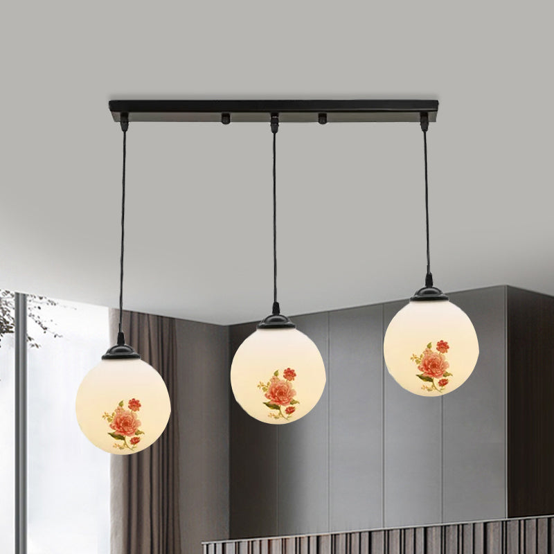 Ball Frosted White Glass Multi Light Pendant Minimalist 3 Bulbs Dining Room Suspension Lamp with Linear/Round Canopy and Floral Pattern White A Linear Clearhalo 'Ceiling Lights' 'Close To Ceiling Lights' 'Glass shade' 'Glass' 'Pendant Lights' 'Pendants' Lighting' 802295