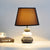 Stone Shape Nightstand Light Modernism Ceramics 1 Light Bedroom Fabric Table Lamp in Black/Grey and White Black Clearhalo 'Lamps' 'Table Lamps' Lighting' 813543