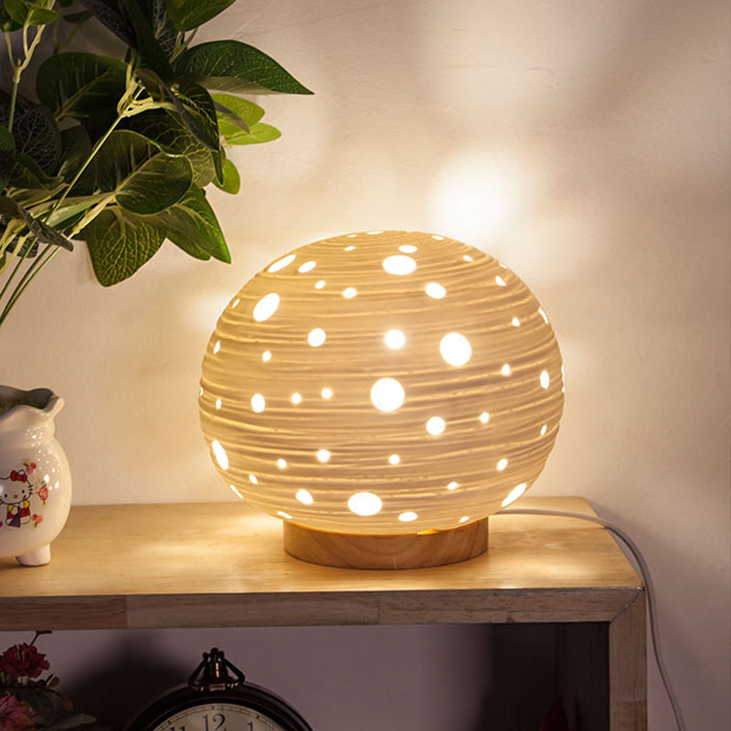 1 Head Bedroom Night Table Light Contemporary White Desk Lamp with Laser-Cut Ball Ceramics Shade White Clearhalo 'Lamps' 'Table Lamps' Lighting' 813571