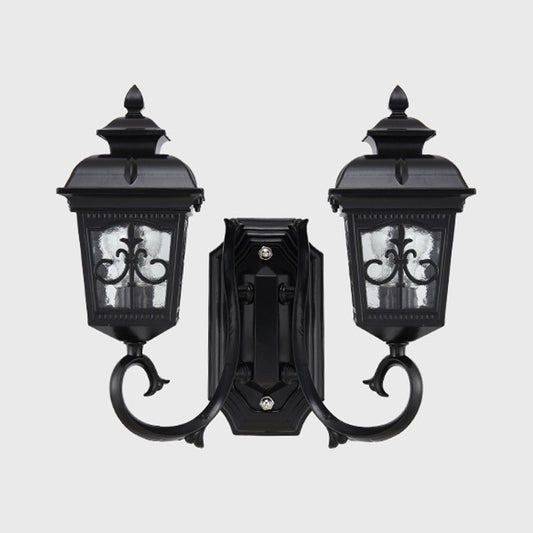 2 Bulbs Lantern Wall Mount Lighting Vintage Black Finish Clear Glass Wall Light Fixture with Curved Arm Clearhalo 'Wall Lamps & Sconces' 'Wall Lights' Lighting' 815072