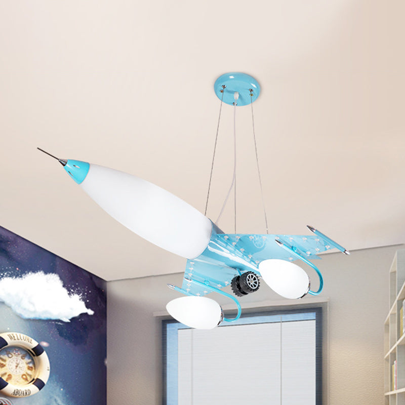Cartoon Plane Hanging Chandelier Metallic LED Kids Bedroom Pendulum Light in Blue with Opal Glass Shade Blue Clearhalo 'Ceiling Lights' 'Chandeliers' Lighting' options 817124_fba54201-4200-4396-aecc-81a7de097b37