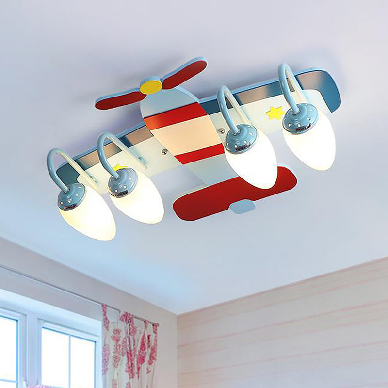Wood Airplane Ceiling Flush Cartoon 4-Light Blue and Red Flush Mount Lamp with Bullet Opal Glass Shade Blue Clearhalo 'Ceiling Lights' 'Close To Ceiling Lights' 'Close to ceiling' 'Glass shade' 'Glass' 'Pendant Lights' 'Semi-flushmount' Lighting' 819160