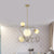 Nordic Ball Chandelier Light Frosted Glass 4-Bulb Living Room Pendant Lamp in Gold with Triangle Cage Gold Clearhalo 'Ceiling Lights' 'Chandeliers' Lighting' options 819374_316a274d-abb2-435e-a6c7-3127755c3e21