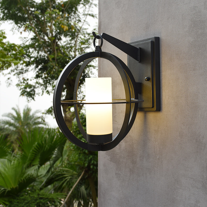 1 Bulb Cylinder Sconce Rural Black Frosted Glass Wall Lighting Fixture with Global Metal Cage Black Clearhalo 'Wall Lamps & Sconces' 'Wall Lights' Lighting' 819900