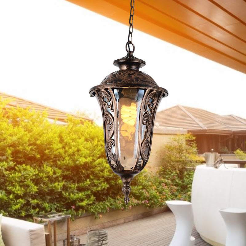 Urn Amber Glass Down Lighting Lodge 1-Bulb Outdoor Pendant Ceiling Light in Bronze Bronze Clearhalo 'Ceiling Lights' 'Chandeliers' 'Glass shade' 'Glass' 'Pendant Lights' 'Pendants' Lighting' 852450