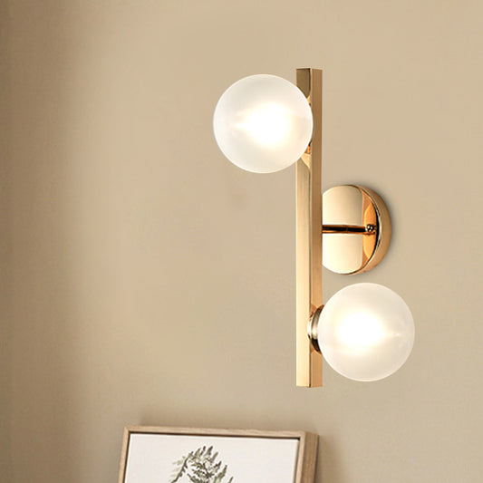 Opal Glass Globe Wall Lighting Post Modern 2 Heads Brass Wall Mount Lamp Fixture with Linear Design Brass Clearhalo 'Cast Iron' 'Glass' 'Industrial' 'Modern wall lights' 'Modern' 'Tiffany' 'Traditional wall lights' 'Wall Lamps & Sconces' 'Wall Lights' Lighting' 852540
