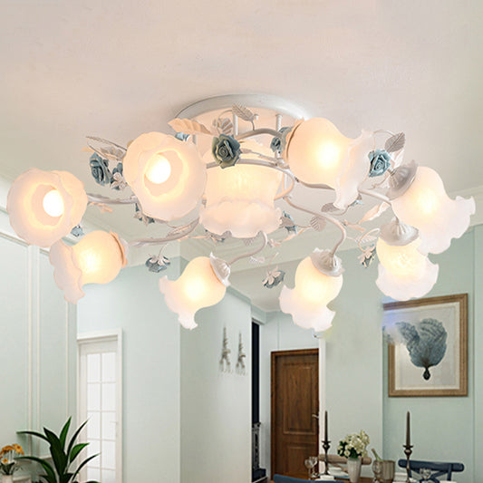 Frosted Glass Bud Semi Flush Chandelier Countryside 3/5/9-Bulb Dining Room Ceiling Mount Lamp in Pink/Blue/Blue-White 9 Blue Clearhalo 'Ceiling Lights' 'Close To Ceiling Lights' 'Close to ceiling' 'Glass shade' 'Glass' 'Semi-flushmount' Lighting' 863168