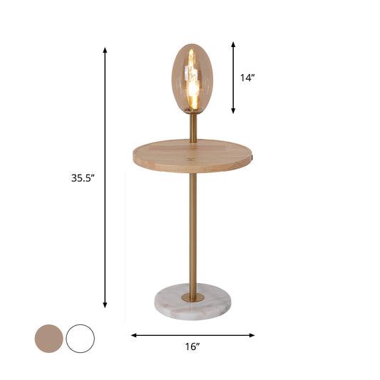 Cognac/White Glass Egg Shape Floor Lighting Modernist 1 Light Standing Floor Lamp with Wood Storage Board Clearhalo 'Floor Lamps' 'Lamps' Lighting' 863304
