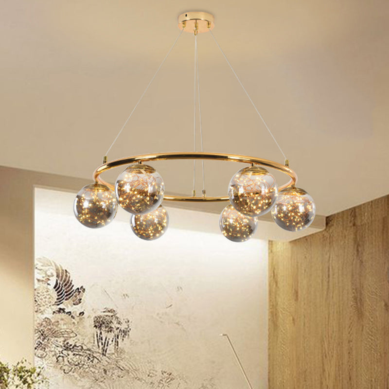 Smoke Gray Glass Ball Ceiling Chandelier Modernist 6 Heads Brass Ring Hanging Lighting with Glowworm Design Inside Clearhalo 'Ceiling Lights' 'Chandeliers' 'Modern Chandeliers' 'Modern' Lighting' 875468