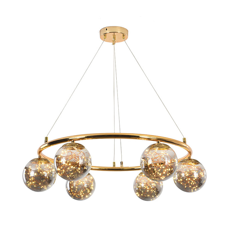 Smoke Gray Glass Ball Ceiling Chandelier Modernist 6 Heads Brass Ring Hanging Lighting with Glowworm Design Inside Clearhalo 'Ceiling Lights' 'Chandeliers' 'Modern Chandeliers' 'Modern' Lighting' 875469