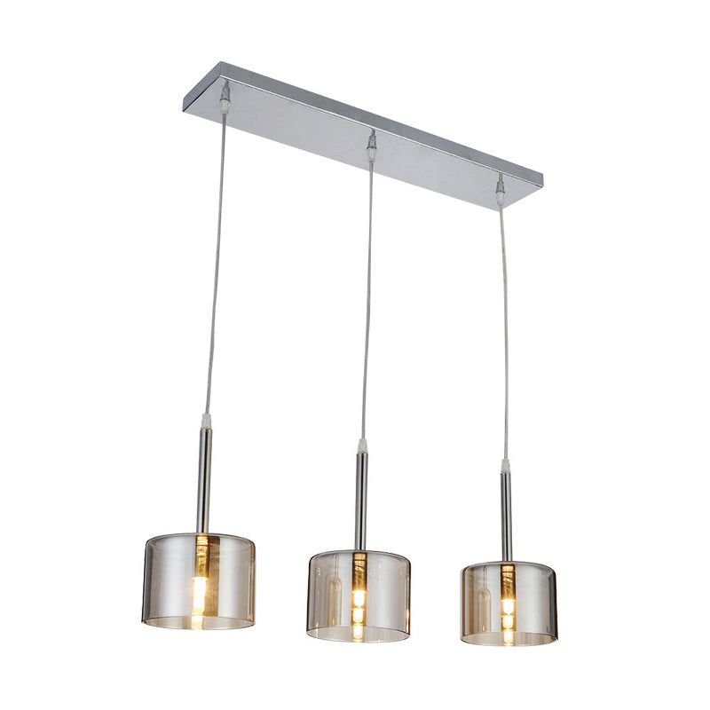 3-Bulb Restaurant Multi-Pendant Modernist Chrome Suspension Light with Drum Clear Glass Shade Clearhalo 'Ceiling Lights' 'Close To Ceiling Lights' 'Glass shade' 'Glass' 'Modern Pendants' 'Modern' 'Pendant Lights' 'Pendants' Lighting' 875479