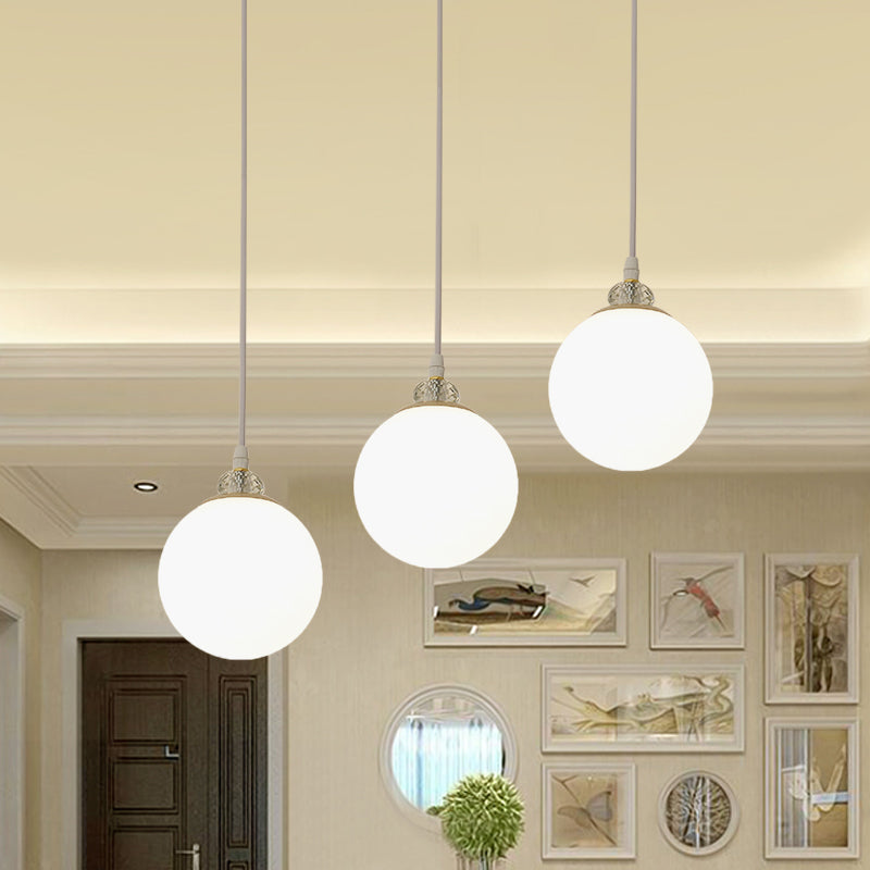 White/Black Waterdrop Multiple Hanging Light 3-Bulb Clear and Opal Glass Pendant Lamp with Linear Canopy Clearhalo 'Ceiling Lights' 'Glass shade' 'Glass' 'Modern Pendants' 'Modern' 'Pendant Lights' 'Pendants' Lighting' 875487