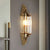 1 Head Cylinder Sconce Light Contemporary Brass Crystal Wall Mount Lamp for Living Room Brass Clearhalo 'Cast Iron' 'Glass' 'Industrial' 'Modern wall lights' 'Modern' 'Tiffany' 'Traditional wall lights' 'Wall Lamps & Sconces' 'Wall Lights' Lighting' 886243