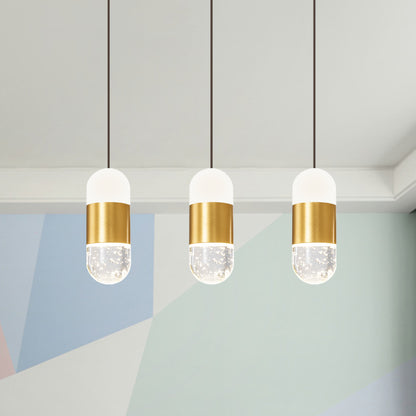Brass 3-Head Cluster Pendant Minimalist Seedy Crystal Capsule Hanging Ceiling Light for Dining Room Brass Clearhalo 'Ceiling Lights' 'Modern Pendants' 'Modern' 'Pendant Lights' 'Pendants' Lighting' 886251