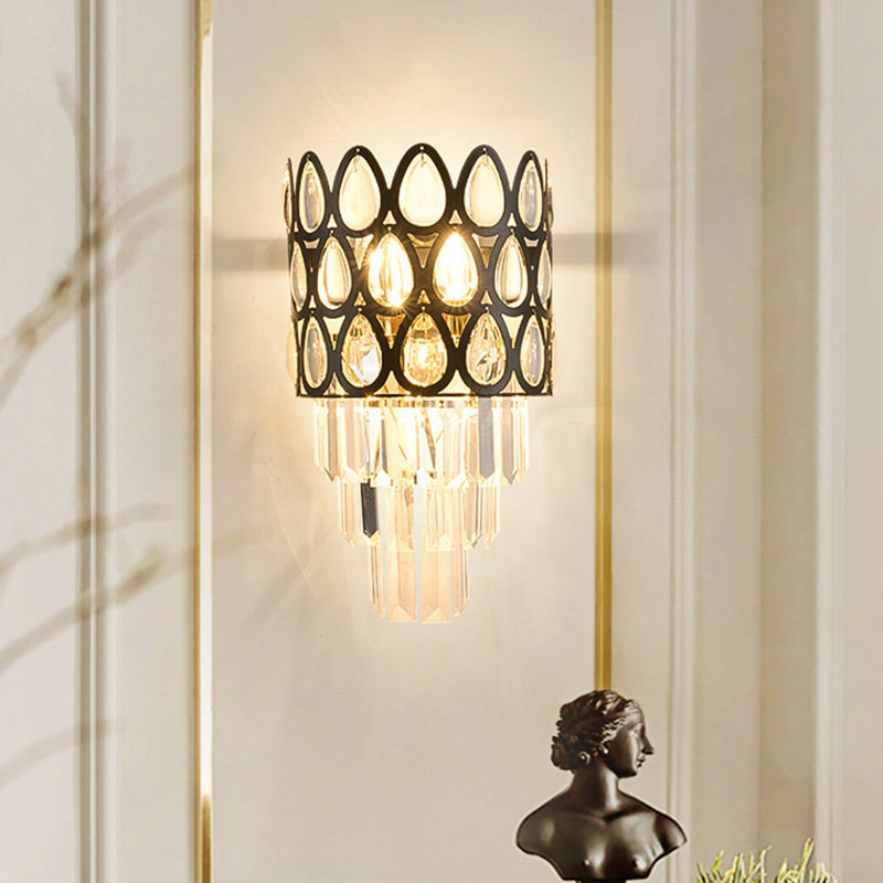 Minimalism Tiered Sconce Light 3-Bulb Clear Crystal Wall Lamp Fixture in Black for Living Room Clearhalo 'Cast Iron' 'Glass' 'Industrial' 'Modern wall lights' 'Modern' 'Tiffany' 'Traditional wall lights' 'Wall Lamps & Sconces' 'Wall Lights' Lighting' 888999