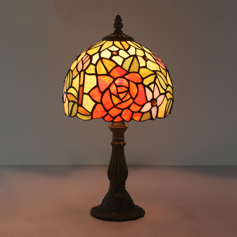 Bronze 1 Head Night Table Light Tiffany Style Cut Glass Yellow/Orange/Purple Rose Patterned Desk Lighting with Dome Shade Orange Clearhalo 'Lamps' 'Table Lamps' Lighting' 889894