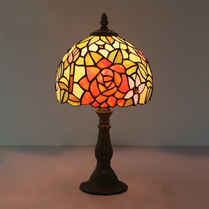 Bronze 1 Head Night Table Light Tiffany Style Cut Glass Yellow/Orange/Purple Rose Patterned Desk Lighting with Dome Shade Orange Clearhalo 'Lamps' 'Table Lamps' Lighting' 889894