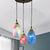 3-Light Cluster Pendant Tiffany Oval Handcrafted Stained Glass Hanging Ceiling Light in Black Black Clearhalo 'Ceiling Lights' 'Close To Ceiling Lights' 'Industrial' 'Middle Century Pendants' 'Pendant Lights' 'Pendants' 'Tiffany close to ceiling' 'Tiffany Pendants' 'Tiffany' Lighting' 890153