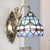 Dome Wall Mounted Lamp 1-Bulb Stained Glass Mediterranean Tulip Patterned Wall Lighting in White/Blue with Mermaid Arm Blue Clearhalo 'Art deco wall lights' 'Cast Iron' 'Glass' 'Industrial' 'Middle century wall lights' 'Modern' 'Tiffany wall lights' 'Tiffany' 'Traditional wall lights' 'Wall Lamps & Sconces' 'Wall Lights' Lighting' 890320
