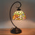 Bronze Curvy Night Light Baroque 1 Head Metal Red/Pink Rose/Tulip Patterned Desk Lighting with Bowl Cut Glass Shade Orange Clearhalo 'Desk Lamps' 'Lamps' Lighting' 893991