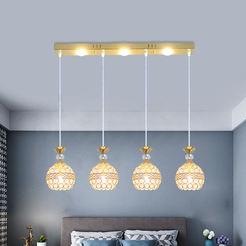 4 Heads Dining Room Multi Ceiling Light Modernist Gold Finish Pendulum Lamp with Globe Crystal Embedded Shade Clearhalo 'Ceiling Lights' 'Modern Pendants' 'Modern' 'Pendant Lights' 'Pendants' Lighting' 897522