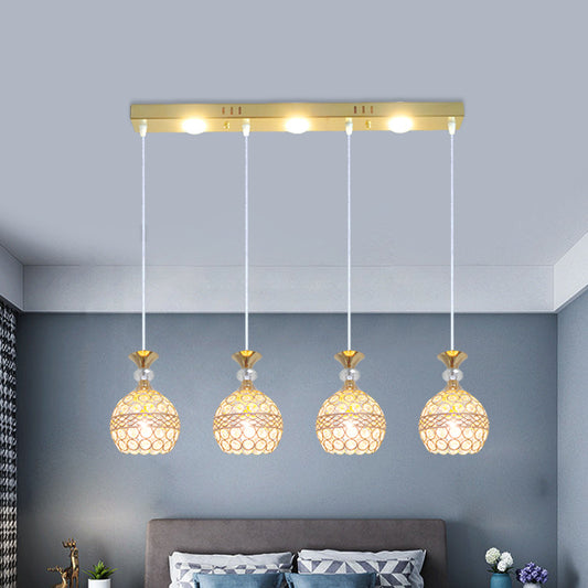 4 Heads Dining Room Multi Ceiling Light Modernist Gold Finish Pendulum Lamp with Globe Crystal Embedded Shade Clearhalo 'Ceiling Lights' 'Modern Pendants' 'Modern' 'Pendant Lights' 'Pendants' Lighting' 897522