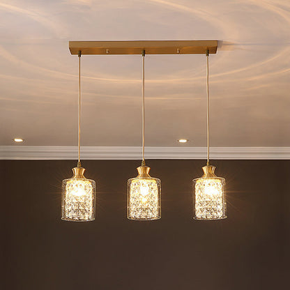 Cylinder Faceted Crystal Multi-Light Pendant Modernist 3 Heads Gold Hanging Lamp with Clear Glass Shade Gold Clearhalo 'Ceiling Lights' 'Close To Ceiling Lights' 'Glass shade' 'Glass' 'Modern Pendants' 'Modern' 'Pendant Lights' 'Pendants' Lighting' 916247