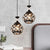 Hollow Out Flower Iron Suspension Light Modern 1-Head Black Finish Pendulum Lamp with Crystal Accent Black Clearhalo 'Ceiling Lights' 'Modern Pendants' 'Modern' 'Pendant Lights' 'Pendants' Lighting' 916295
