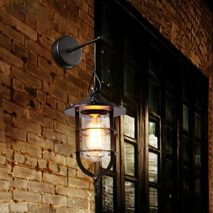1 Bulb Caged Wall Mounted Light Fixture Industrial Black Clear Glass Lighting for Porch Clearhalo 'Art deco wall lights' 'Cast Iron' 'Glass' 'Industrial wall lights' 'Industrial' 'Middle century wall lights' 'Modern' 'Rustic wall lights' 'Tiffany' 'Traditional wall lights' 'Wall Lamps & Sconces' 'Wall Lights' Lighting' 92696