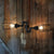 Black Wire Frame Wall Lighting Fixture with Pipe Rustic Metal 2 Lights Restaurant Wall Sconce Light Black Clearhalo 'Art deco wall lights' 'Cast Iron' 'Glass' 'Industrial wall lights' 'Industrial' 'Middle century wall lights' 'Modern' 'Rustic wall lights' 'Tiffany' 'Traditional wall lights' 'Wall Lamps & Sconces' 'Wall Lights' Lighting' 95688