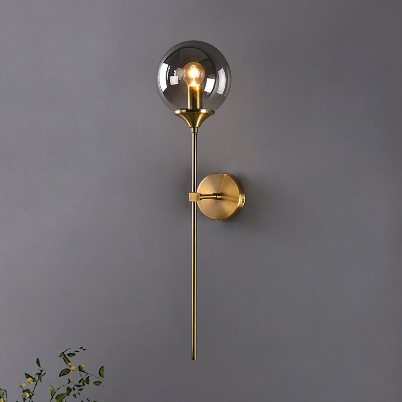 Modern Globe Shade Wall Lighting Single Bulb Clear/Grey/Amber Glass Sconce Light in Brass for Bedroom Clearhalo 'Art deco wall lights' 'Cast Iron' 'Glass' 'Industrial wall lights' 'Industrial' 'Middle century wall lights' 'Modern' 'Rustic wall lights' 'Tiffany' 'Traditional wall lights' 'Wall Lamps & Sconces' 'Wall Lights' Lighting' 968940