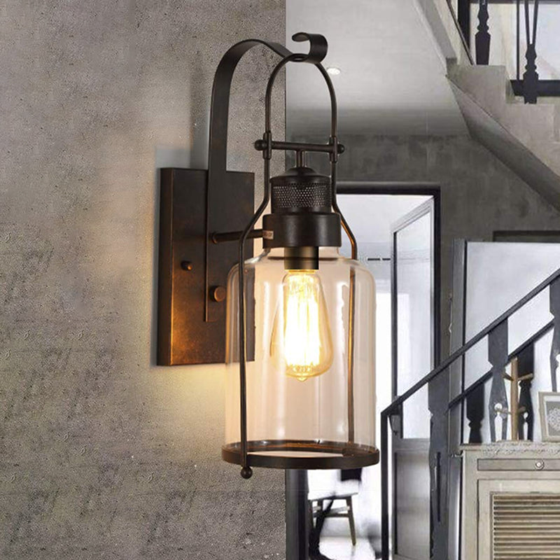 Cylinder Corridor Wall Light Fixture Industrial Clear Glass 1 Light Black Sconce Lamp with Cage Clearhalo 'Cast Iron' 'Glass' 'Industrial wall lights' 'Industrial' 'Middle century wall lights' 'Modern' 'Tiffany' 'Traditional wall lights' 'Wall Lamps & Sconces' 'Wall Lights' Lighting' 968998