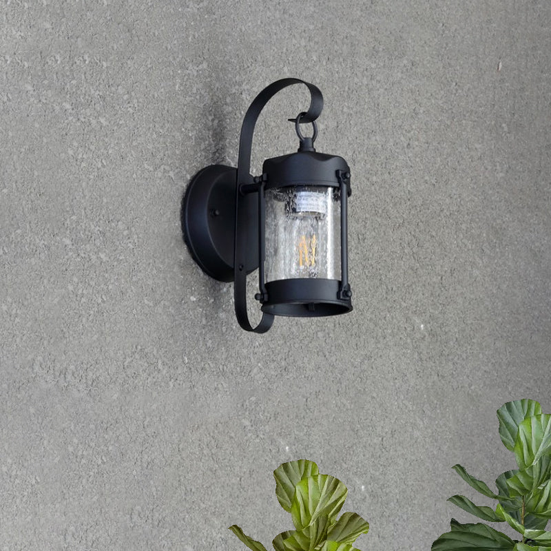 Cylinder/Lantern Seeded Glass Wall Hanging Light Traditional Single Bulb Outdoor Sconce Lamp in Clear Clearhalo 'Art deco wall lights' 'Cast Iron' 'Glass' 'Industrial wall lights' 'Industrial' 'Middle century wall lights' 'Modern' 'Rustic wall lights' 'Tiffany' 'Traditional wall lights' 'Wall Lamps & Sconces' 'Wall Lights' Lighting' 969005