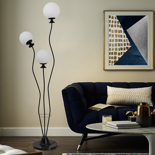Ball Standing Light with Curved Arm Modernist Glass 3 Heads Living Room Floor Reading Lamp in Black/White Black Clearhalo 'Floor Lamps' 'Lamps' Lighting' 978460