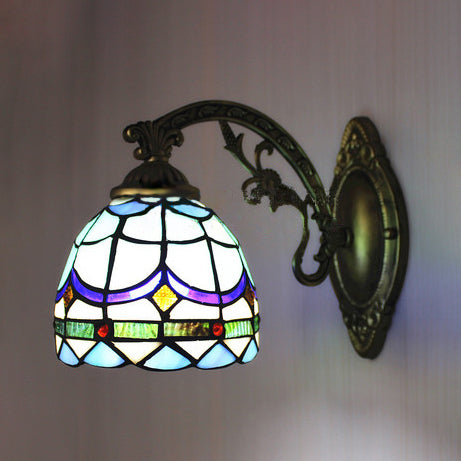 Stained Glass Domed Wall Lamp with Carved Arm 1 Light Tiffany Traditional Wall Lamp in Blue Clearhalo 'Industrial' 'Middle century wall lights' 'Tiffany wall lights' 'Tiffany' 'Wall Lamps & Sconces' 'Wall Lights' Lighting' 98140