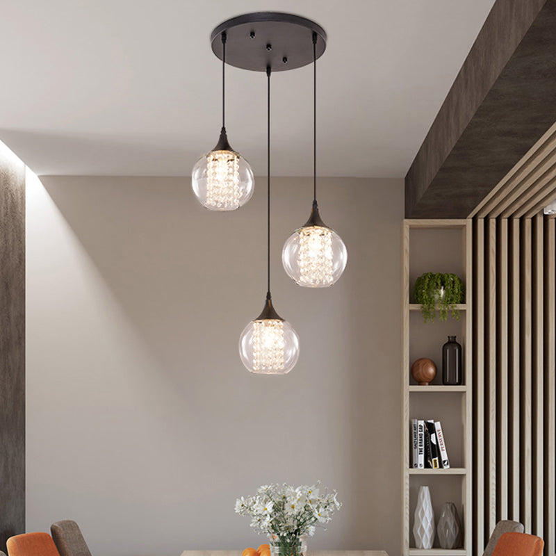 Simple Style Globe Multi Ceiling Light Clear Glass 3 Bulbs Dining Room Hanging Lamp in Black, Round/Linear Canopy Black Round Clearhalo 'Ceiling Lights' 'Glass shade' 'Glass' 'Modern Pendants' 'Modern' 'Pendant Lights' 'Pendants' Lighting' 982663
