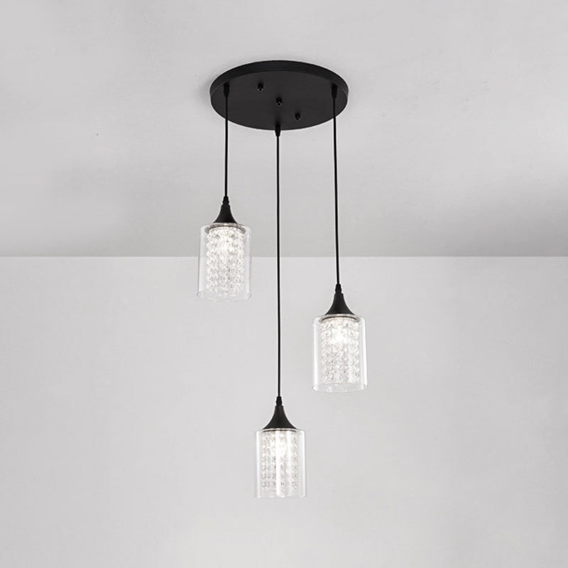 Clear Glass Cylinder Multiple Hanging Light Minimalist 3-Light Black Pendulum Lamp with Linear/Round Canopy Clearhalo 'Ceiling Lights' 'Close To Ceiling Lights' 'Glass shade' 'Glass' 'Modern Pendants' 'Modern' 'Pendant Lights' 'Pendants' Lighting' 982673